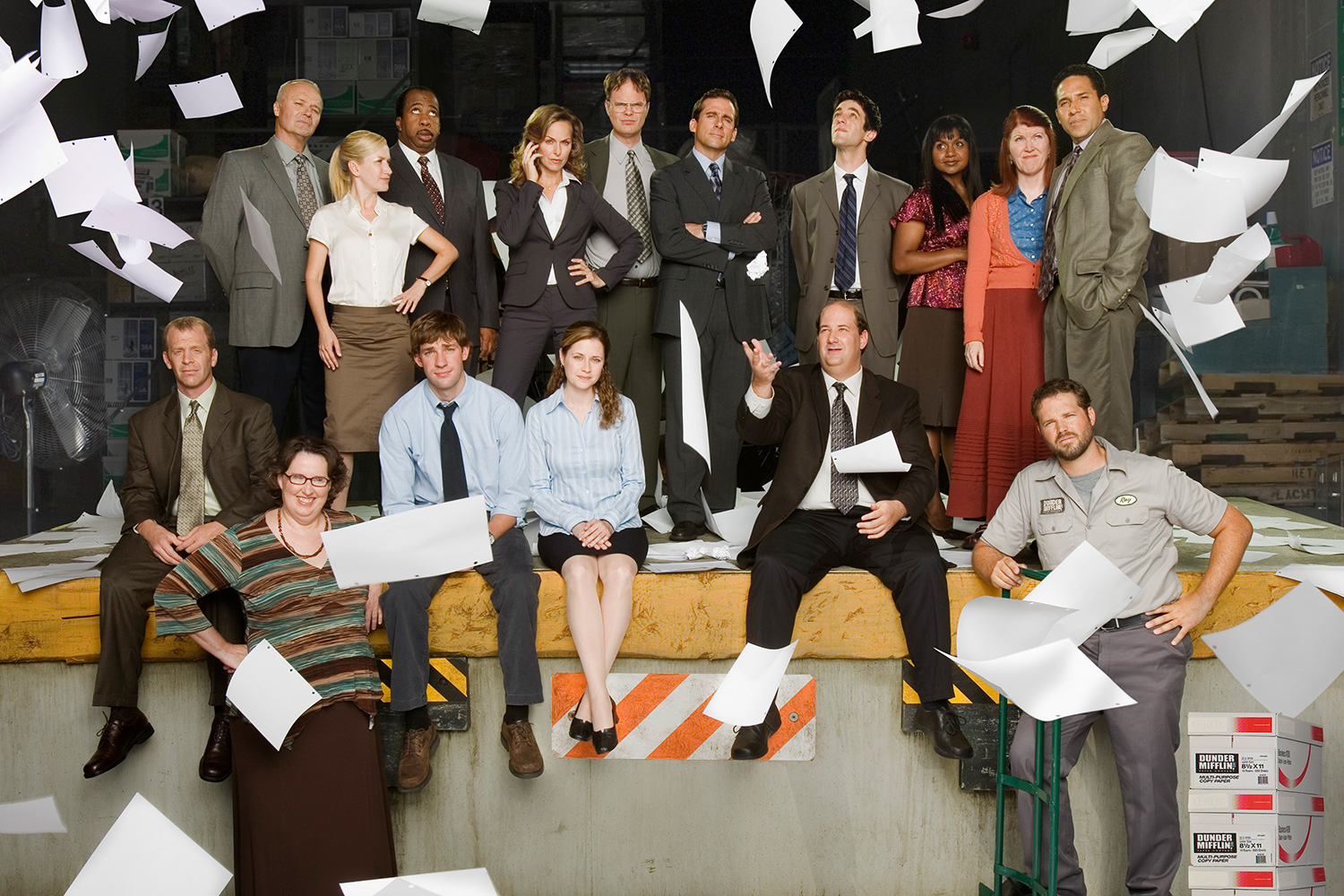 Cast of The Office wih papers thrown everywhere